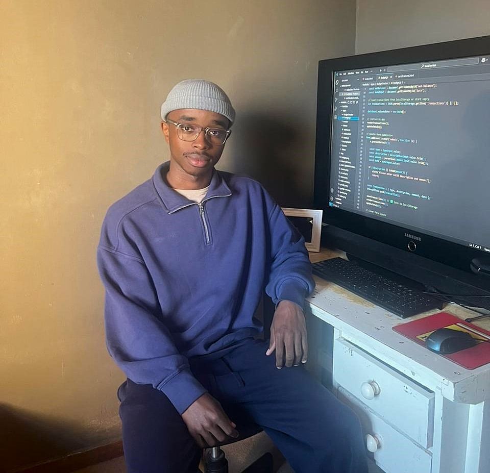 Tom at Desk